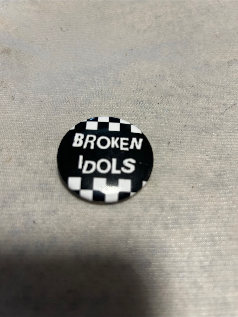 Broken Idols Black & White Pin Button